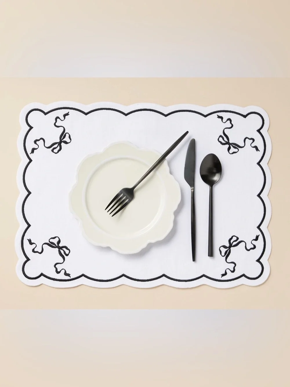 nwt set of 2 Anthropologie Benedita Black Bow Placemats